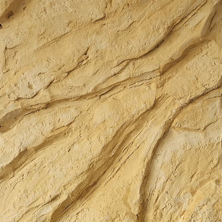 Parement mural effet grès blond sculpté à la main, grain fin, teinte sable et relief en drapé